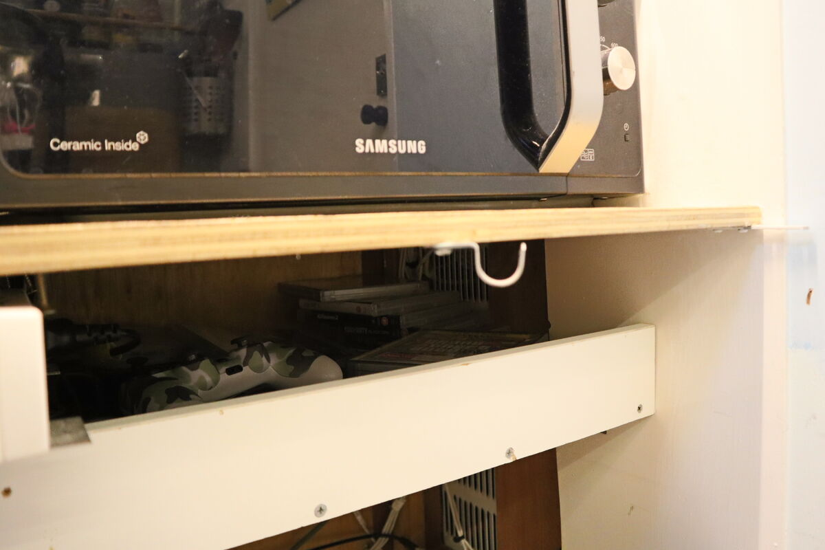 Game storage compartment